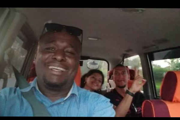 Happy customers in rental car